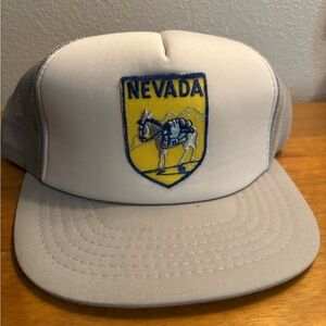 Nevada Embroidered Truckers Cap in White and Gray SnapBack